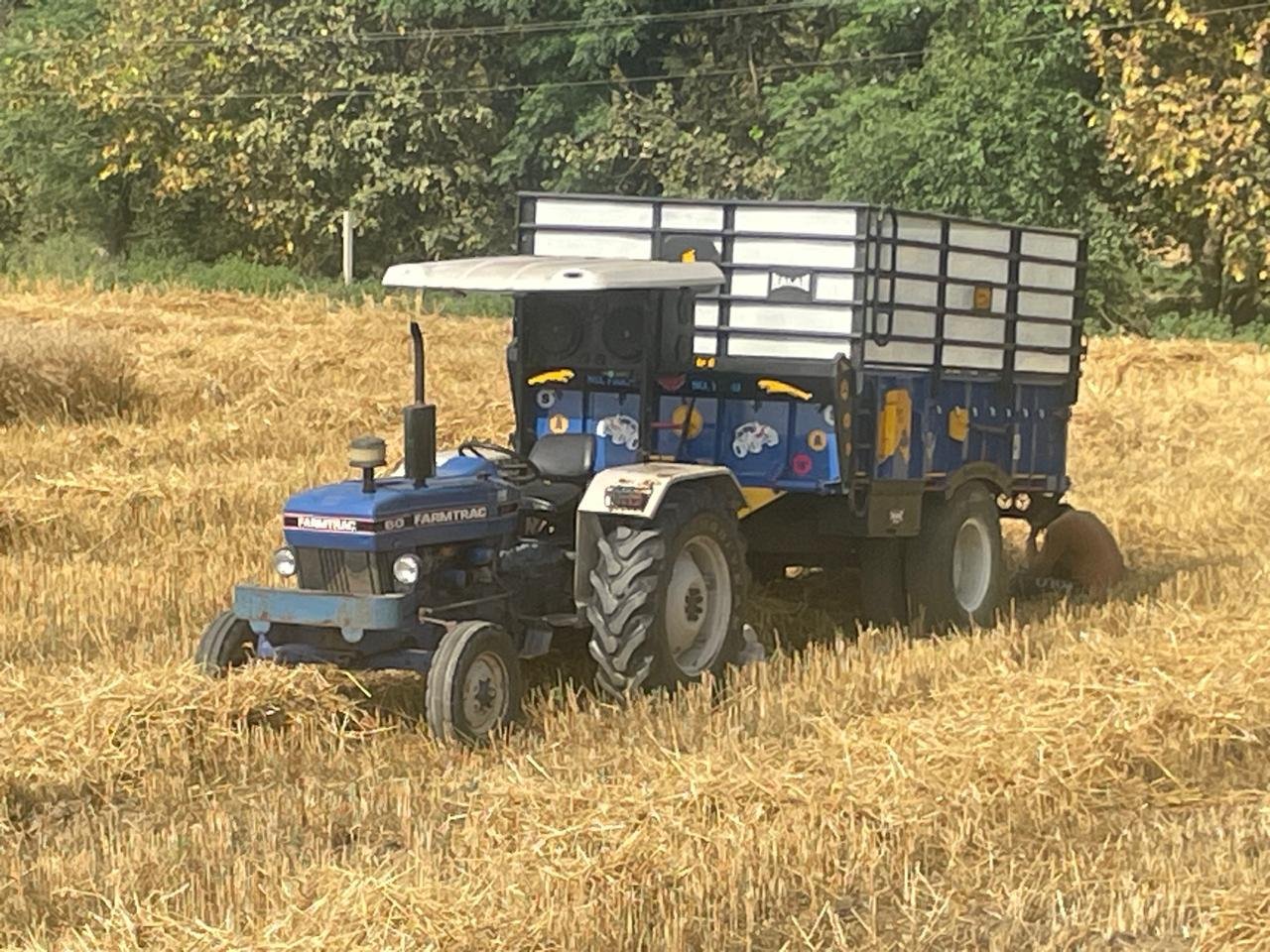 A tractor and trailer used to move a harvest
